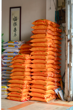 HOI AN, VIETNAM - MARCH 15, 2015. Rice bags at the warehouse in Chinatown, Hoi An, Vietnam.のeditorial素材