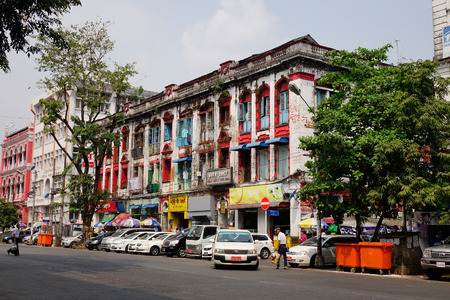Yangon, Myanmar - Feb 26, 2016. The Sule Boulevard with many British old buildings. Sule Boulevard are the busiest street in Yangon.のeditorial素材