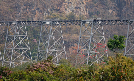 Gokteik Viaduct railroad bridge crosses a deep canyon at sunny day in Central Shan State, Myanmar (Burma).の写真素材