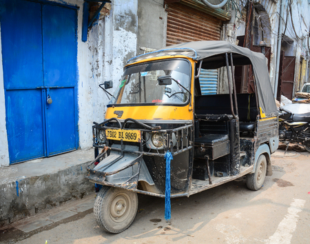 Amritsar, India - Jul 25, 2015. A tuk tuk (taxi) parking on street at old town in Amritsar, India.のeditorial素材