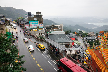 Jiufen, Taiwan - Jan 7, 2016. Hillside houses at old village in Jiufen, Taiwan. People can seen walking and exploring around it.のeditorial素材