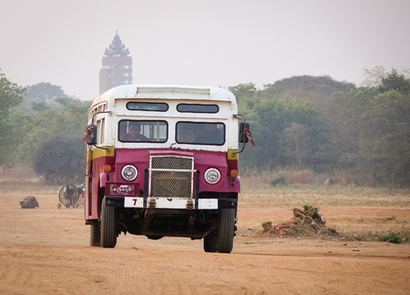 Bagan, Myanmar - Feb 20, 2016. Old bus carrying tourists to hot air balloon station in Bagan, Myanmar.のeditorial素材