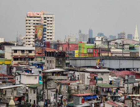 Manila, Philippines - Dec 20, 2015. Many shacks located at slum region in Manila, Philippines. Manila is a Philippines capital with very strong contrasts in standard of living.のeditorial素材