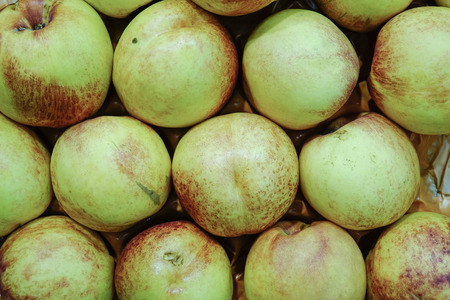 Fresh ripe peaches for sale at the European market. Closed up.の写真素材