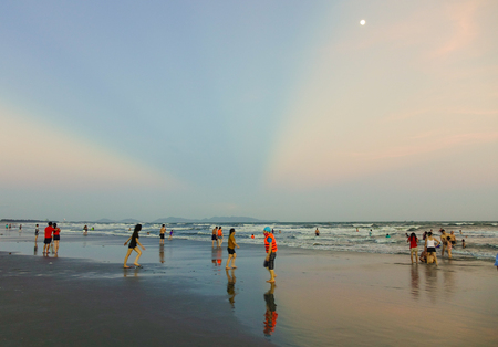 Vung Tau, Vietnam - Nov 12, 2016. Local people playing on the beach at sunset in Vung Tau, Vietnam. Vung Tau is one of famous destinations near Saigon.のeditorial素材