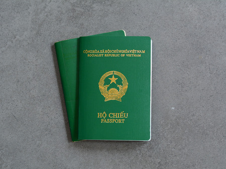 Vietnamese passports on the stone floor. Closed-up.の写真素材