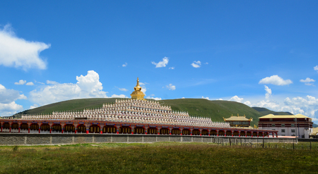 Main Hall at Yarchen Gar Monastery in Garze Tibetan, Sichuan, China. Yarchen Gar is the largest concentration of nuns and monks in the world.の写真素材