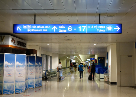 Saigon, Vietnam - Feb 5, 2015. People walking at Tan Son Nhat airport, Saigon, Vietnam. TSN is the largest and the busiest airport in Vietnam with more than 23 million passenger movements per year.のeditorial素材