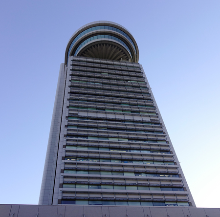 Tokyo, Japan - Dec 6, 2016. Modern building under the blue sky in Tokyo, Japan. Tokyo has the...