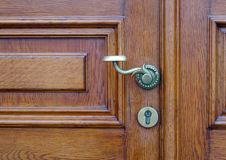 Detail of wooden door with lock at Hermitage Palace in Saint Petersburg, Russia.の写真素材