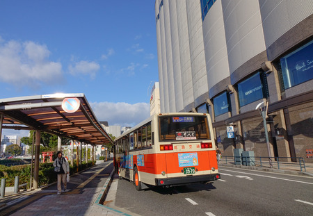 Hiroshima, Japan - Dec 28, 2015. A bus stopping at station in Hiroshima, Japan. Hiroshima had an estimated population of 1,196,274 in 2016.のeditorial素材