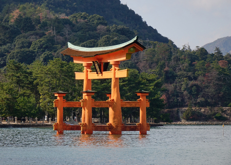 View of floating gate (Giant Torii) of Itsukushima Shrine in Hiroshima, Japan. The temple is a UNESCO World Heritage Site.のeditorial素材
