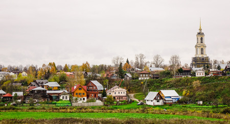 Many wooden houses with a church located at Suzdal town in Vladimir, Russia. Suzdal is one of the oldest Russian towns and a major tourist attraction.の写真素材
