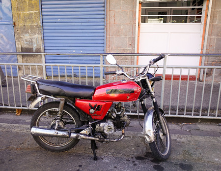 Port Louis, Mauritius - Jan 4, 2017. A motorcycle parking on street in Port Louis, capital of Mauritius.のeditorial素材