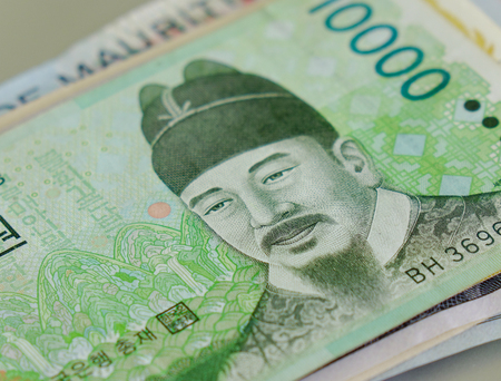 Portraits on banknotes. Korean King on Korea 10,000 won bill.