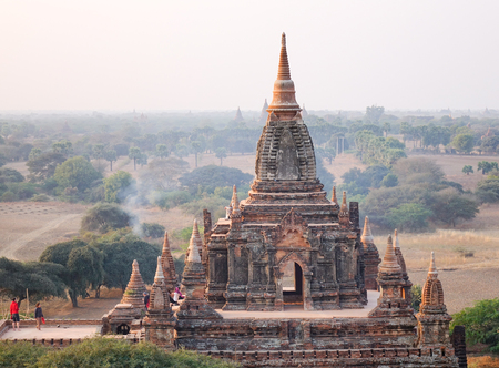 Bagan, Myanmar - Feb 18, 2016. People visit North Guni Temple in Bagan, Myanmar. Bagan is an ancient city and one of Asias most important archeological sites.のeditorial素材