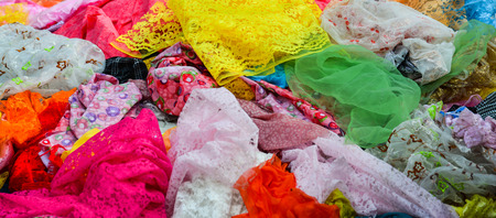 Colorful textile at Asian street market. For shopping, industry, sale and clothing concepts.の写真素材