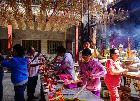 Saigon, Vietnam - Jan 30, 2017. Many people praying at Jade Emperor Temple located in Saigon, Vietnam. The temple is one of the five most important shrines in Saigon (Ho Chi Minh City).のeditorial素材