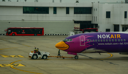 Bangkok, Thailand - Jun 18, 2016. A NokAir airplane on runway at the Don Muang Intl Airport in Bangkok, Thailand. Bangkok is the capital and most populous city of Thailand.のeditorial素材