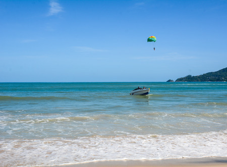 Phuket, Thailand - Jun 19, 2016. People playing parasailing in Phuket, Thailand. Phuket is a melting pot of indigenous Thais, Chinese, ethnic Malays and even sea gypsies.のeditorial素材