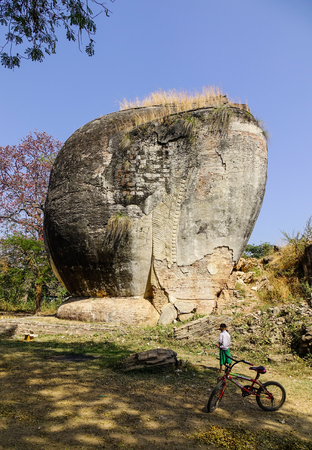 Mandalay, Myanmar - Feb 10, 2017. Ruin of guardian statue in front of Mingun Pahtodawgyi pagoda in Mandalay, Myanmar. The pagoda is one of the famous monuments in the world.のeditorial素材