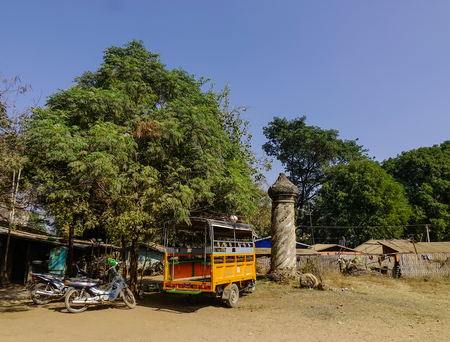 Mandalay, Myanmar - Feb 10, 2017. A local bus parking on rural road in Mandalay, Myanmar. Mandalay is the second largest city and the last royal capital of Myanmar.のeditorial素材