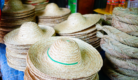 Handmade hats for sale at the local Asian market. Close up.の写真素材