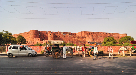 Agra, India - Mar 9, 2012. People visit Agra Fort at the sunny day. The fort was built by the Mughals, can be more accurately described as a walled city in Agra, India.のeditorial素材