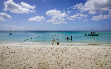 Grand Baie, Mauritius - Jan 10, 2017. People enjoying on the beach in Grand Baie, Mauritius. Mauritius received the World Leading Island Destination award for the third time in 2012.のeditorial素材
