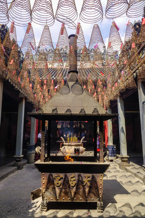 Saigon, Vietnam - Jan 30, 2017. Inside of Jade Emperor Temple at the sunny day in Saigon, Vietnam. U.S. President Obama paid a visit to the pagoda during his state trip in 2016.のeditorial素材