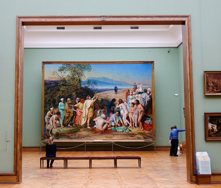 Moscow, Russia - Oct 20, 2016. People seeing a big painting at the State Tretyakov Gallery in Moscow, Russia. The founding year of Tretyakov Gallery is considered to be 1856.のeditorial素材