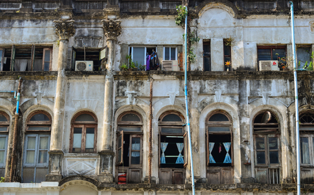 Yangon, Myanmar - Feb 13, 2017. Details of old apartment at downtown in Yangon, Myanmar. Yangon is a former capital of Myanmar and the capital of Yangon Region.のeditorial素材