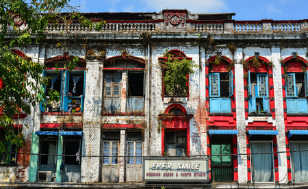 Yangon, Myanmar - Feb 13, 2017. Old apartments at Chinatown in Yangon, Myanmar. Downtown Yangon is still mainly made up of decaying colonial buildings.のeditorial素材