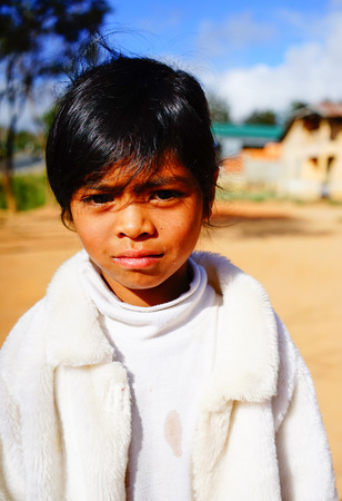 Dalat, Vietnam  - Dec 5, 2015. Portrait of Koho boy Lac Duong village in Dalat, Vietnam. Koho are an ethnic group living in the Dalat township of Central Highlands.のeditorial素材