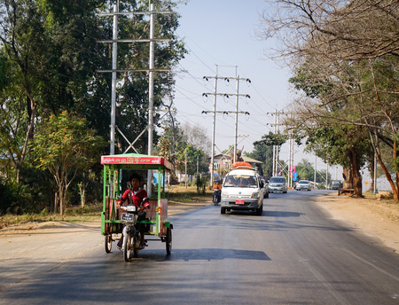 Mandalay, Myanmar - Feb 16, 2016. Vehicles on rural street in Mandalay, Myanmar. Mandalay is the historical old capital, a capital of Myanmar culture.のeditorial素材