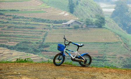 Sapa, Vietnam - May 30, 2016. A bike on rural street in Sapa, Vietnam. Sa Pa is a frontier township and capital of Sa Pa District in Lao Cai Province in north-west Vietnam.のeditorial素材