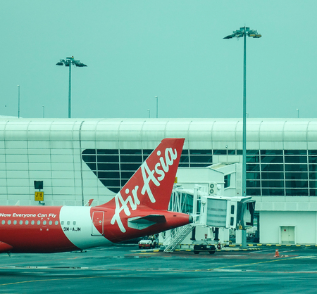 Kuala Lumpur, Malaysia - Dec 16, 2015. Close-up of AirAsia aircraft at the KLIA Airport in Kuala Lumpur, Malaysia. AirAsia is the largest airline in Malaysia by fleet size and destinations.のeditorial素材