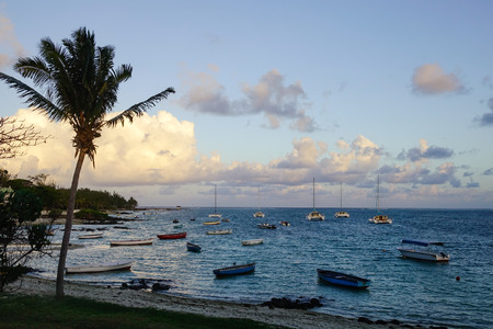 Grand Baie, Mauritius - Jan 11, 2017. View of the sea at sunset in Grand Baie, Mauritius. Mauritius enjoys a tropical climate with clear warm sea waters and tropical beaches.のeditorial素材