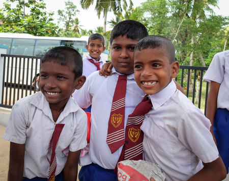Colombo, Sri Lanka - Sep 8, 2015. Boys in uniform playing at school yard in Colombo, Sri Lanka. Colombo is the most populous city in Sri Lanka, with 642,163 people.のeditorial素材