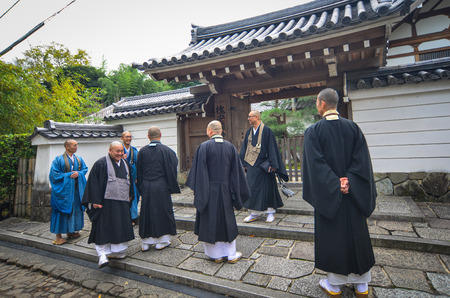 Kyoto, Japan - Nov 28, 2016. Buddhist monks standing at the Eikando temple in Kyoto, Japan. Eikando is formally known as Zenrinji Temple, very famous for its autumn colors.のeditorial素材