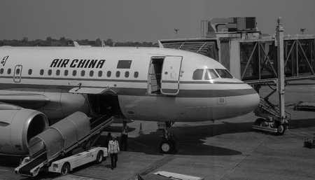 Yangon, Myanmar - Feb 14, 2017. Air China aircraft at the Yangon Intl Airport in Myanmar. Yangon Airport is the primary and busiest international airport of Myanmar.のeditorial素材