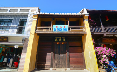 Hoi An, Vietnam - Dec 3, 2015. Old shops located on main street in Hoi An ancient town, Vietnam. Hoi an is recognized as a World Heritage Site by UNESCO.のeditorial素材