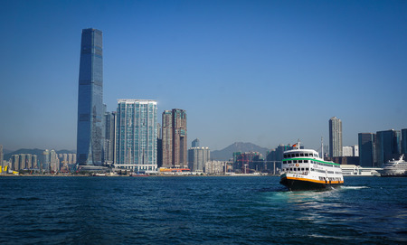 Hong Kong - Dec 30, 2014. A local ferry on the sea in Hong Kong, China. Hong Kong is one of the most popular destinations in the world with 40 millions visitors per year.のeditorial素材
