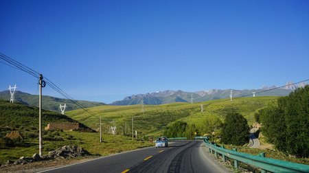 Sichuan, China - Aug 18, 2016. Mountain road in Kham Tibetan, Sichuan, China. Kham is one of the 3 main traditional regions of Tibet, along with U-Tsang and Amdo.のeditorial素材