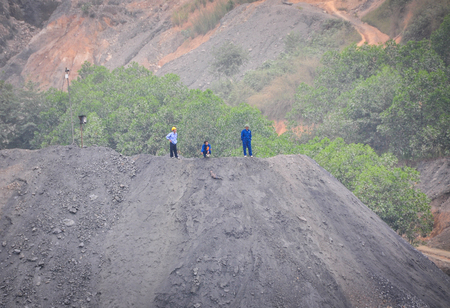Ha Giang, Vietnam - Oct 14, 2014. People working at the mine in Ha Giang province, Vietnam. Ha Giang...
