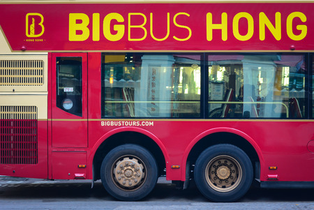 Hong Kong - Dec 30, 2014. A BigBus on street in Hong Kong, China. Hong Kong is an important hub in East Asia with global connections to many of the world cities.のeditorial素材