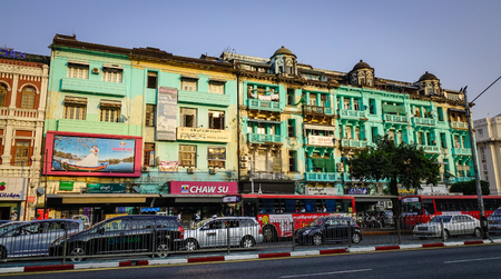 Yangon, Myanmar - Feb 13, 2017. Vehicles running on street at downtown in Yangon, Myanmar. Yangon is the largest city in Myanmar, one of the best places to visit in Asiaのeditorial素材
