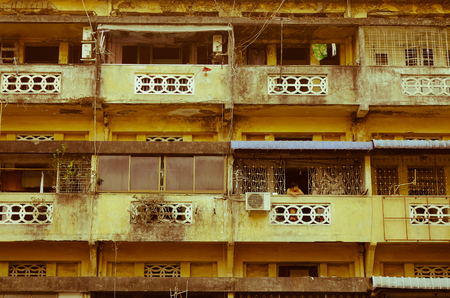 Yangon, Myanmar - Feb 13, 2017. Details of a vintage apartment in Yangon, Myanmar. Most Yangon downtown buildings are four-story mix-use (residential and commercial) buildings.のeditorial素材
