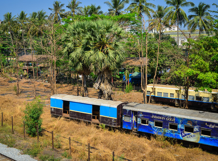 Yangon, Myanmar - Feb 13, 2017. Old train parking at the Central Railway Station in Yangon, Myanmar. Yangon is the country main centre for trade, industry and tourism.のeditorial素材