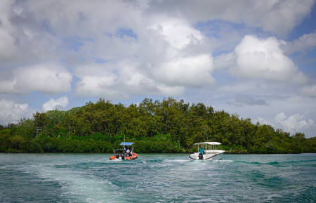Flacq, Mauritius - Jan 12, 2017. Speedboats run on the sea in Ile Aux Cerfs Island, Flacq, Mauritius. The island is one of the must place to visit and see in Mauritius.のeditorial素材